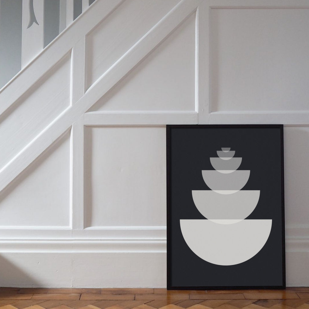 A large vertical minimalist geometric artwork in black and white.