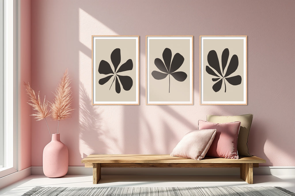 A framed botanical boho wall art set in neutral colors.