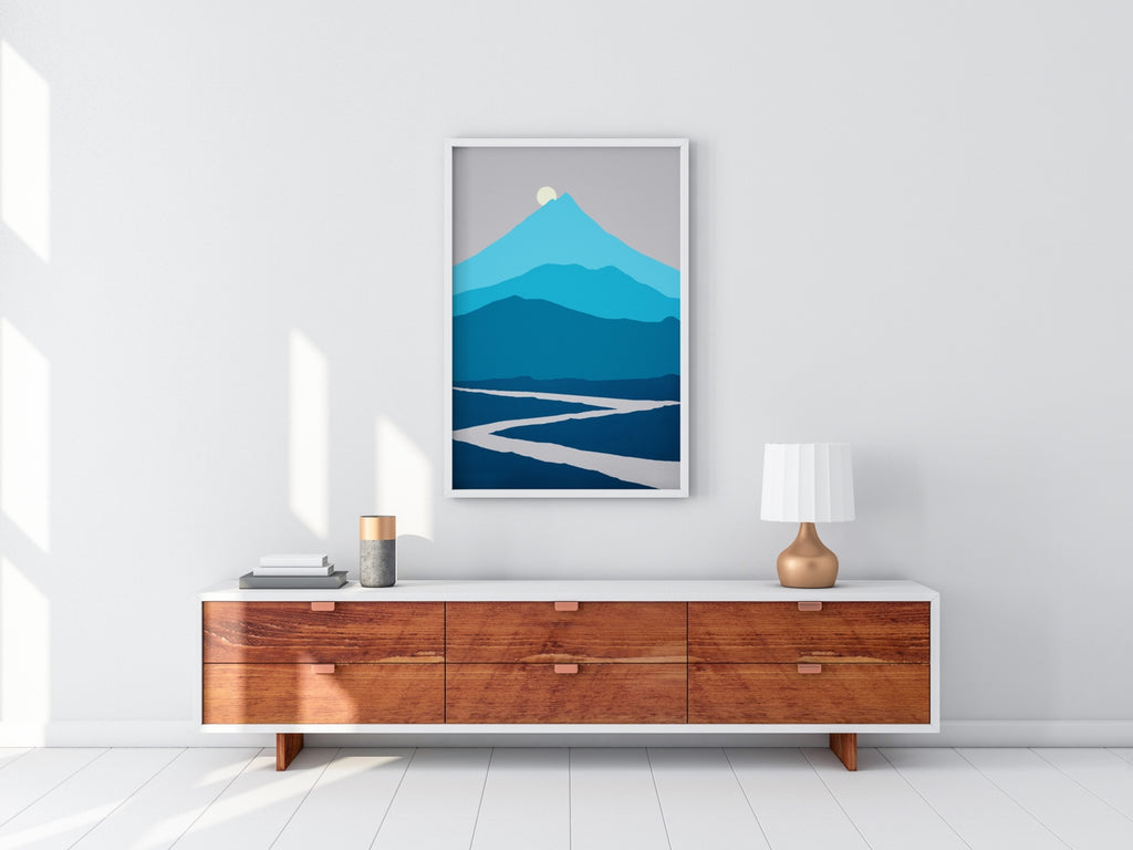 A minimalist mountain wall decor in blue and gray.