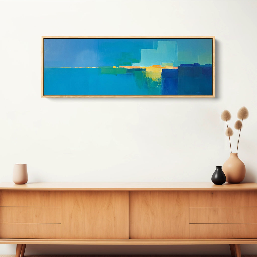 A modern horizontal abstract artwork in blue.
