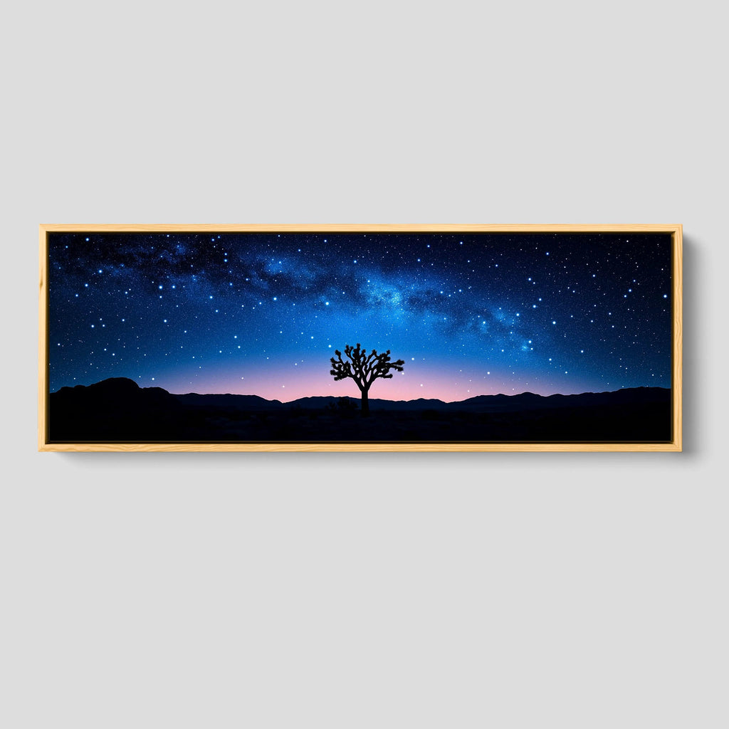 A starry desert wall decor features a dreamy nighttime view of Joshua Tree National Park. 