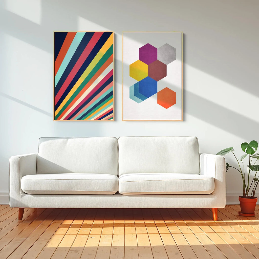 A matching set of two colorful mid-century abstract wall art prints.