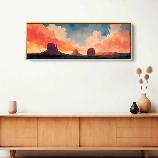 A wide format Monument Valley wall art in warm tones.