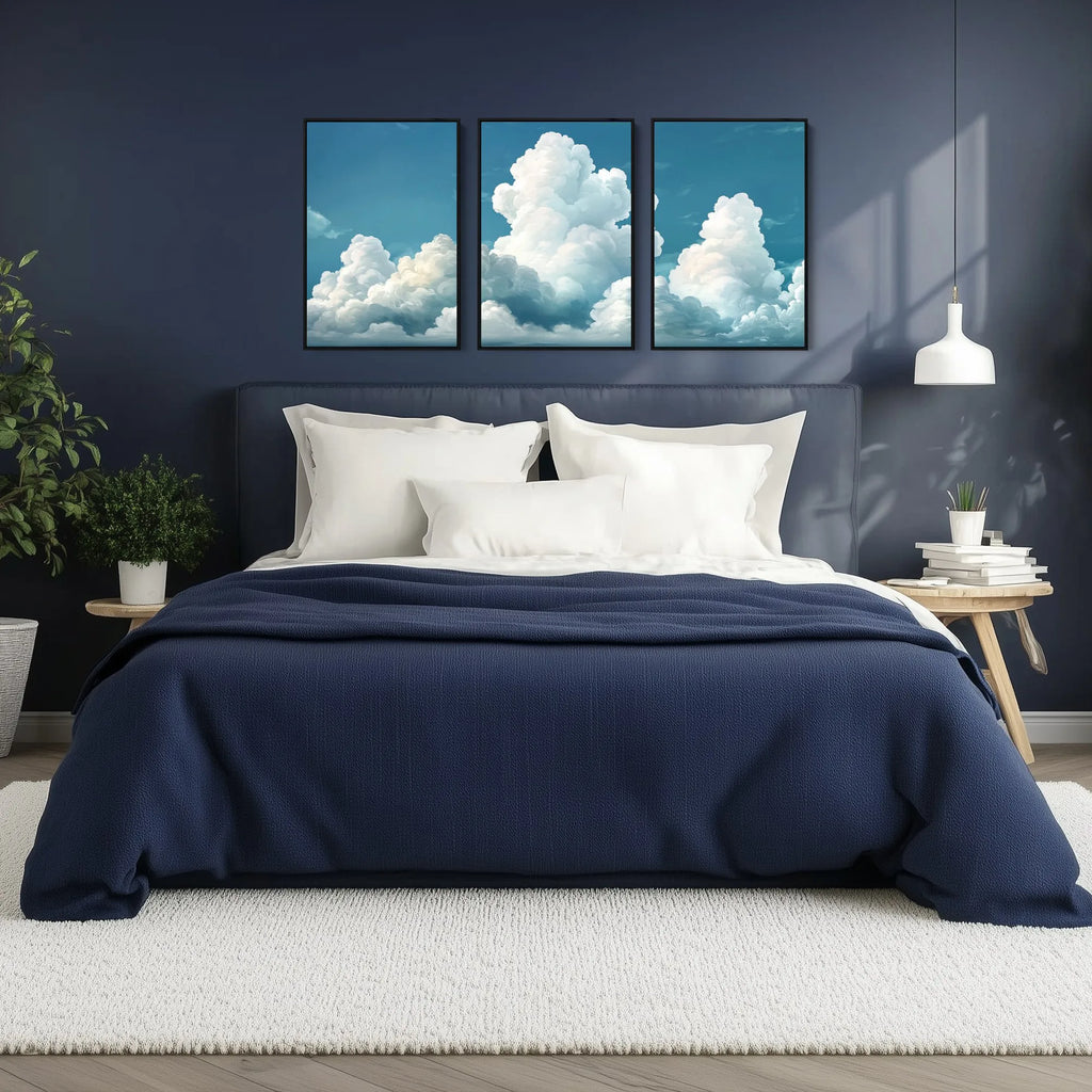 A set of 3 cloud prints, featuring soft, white puffy clouds drifting across a serene sky.