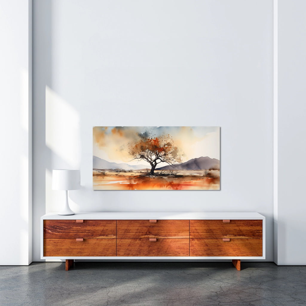 A large southwestern watercolor wall art featuring a lone tree.