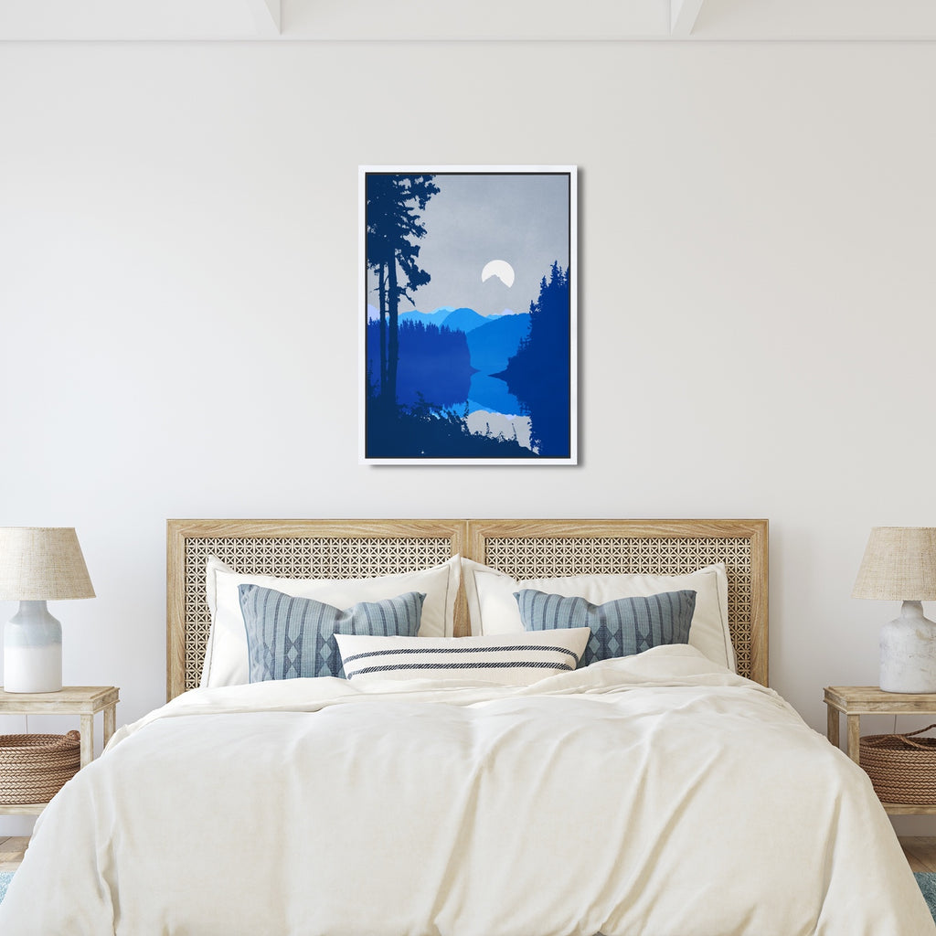 A moon rises above distant misty mountains in shades of blue in this calming artwork.