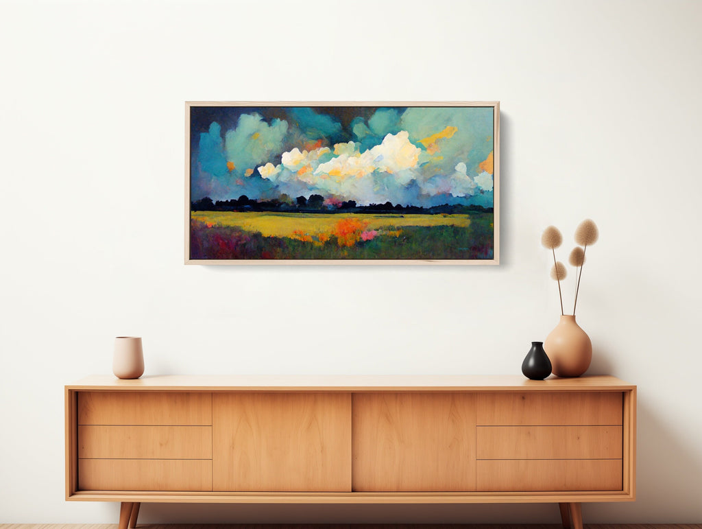 Colorful Framed Western Landscape Art print featuring storm clouds over field of flowers.