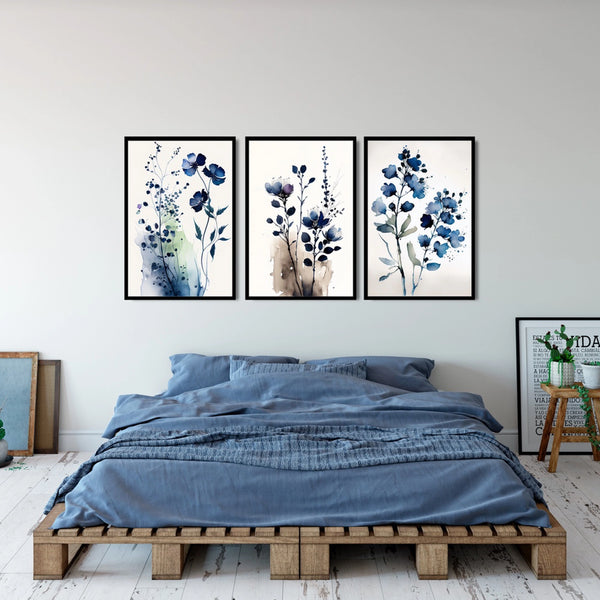 A set of three indigo blue minimalist botanical art prints.