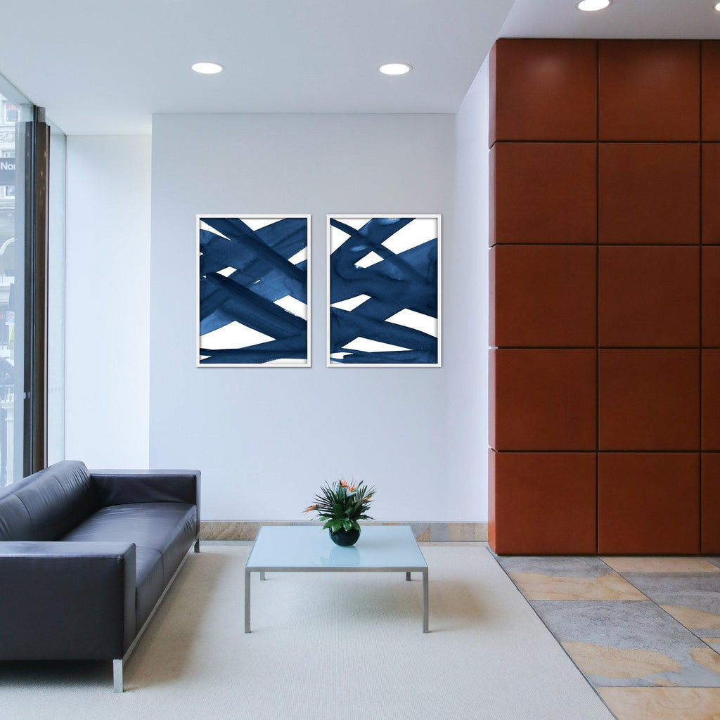 A matching set of two navy blue abstract watercolor canvas prints.