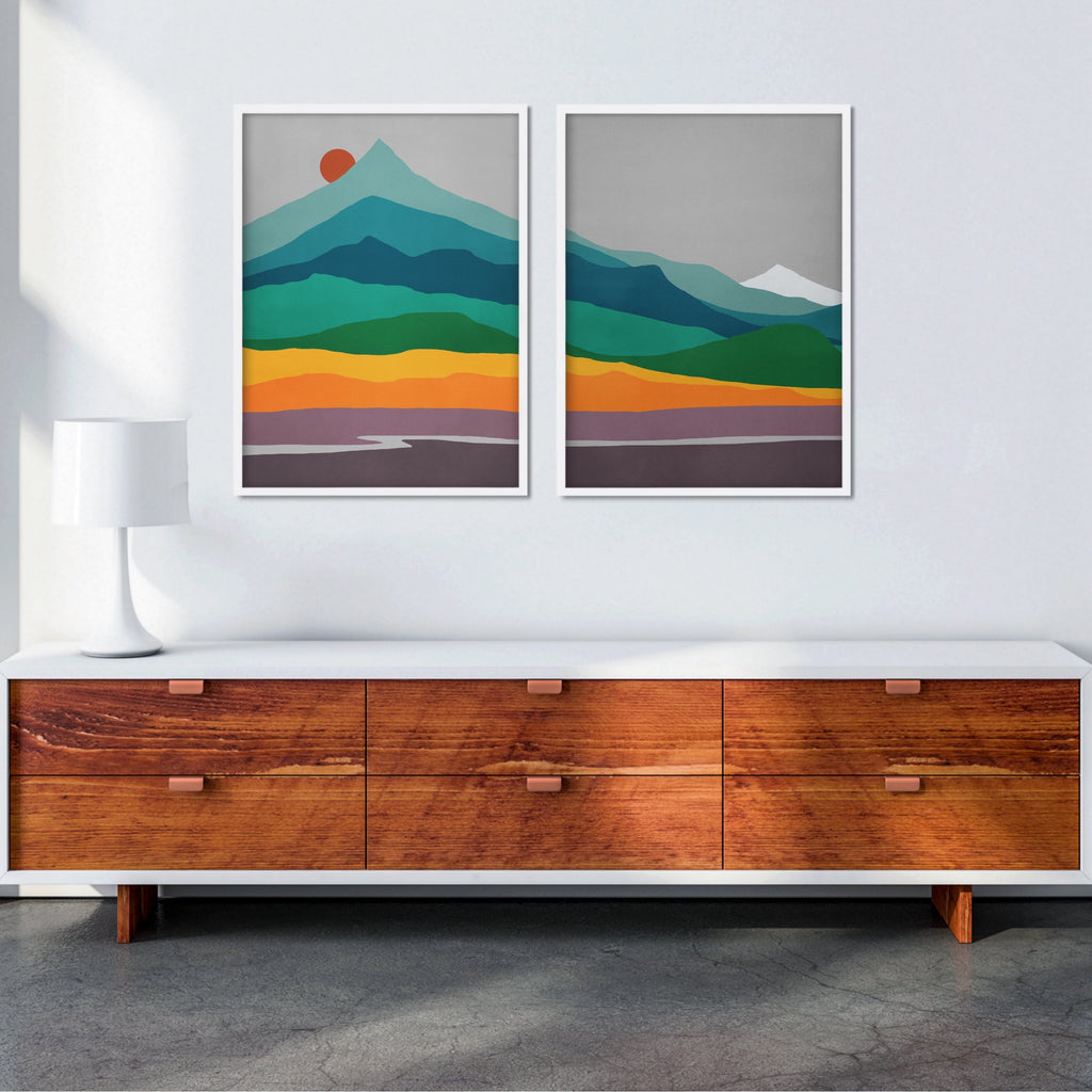 Cool blue mountains rise above warm orange and yellow foothills and the purple sage of the plains in this mid century modern artwork set.