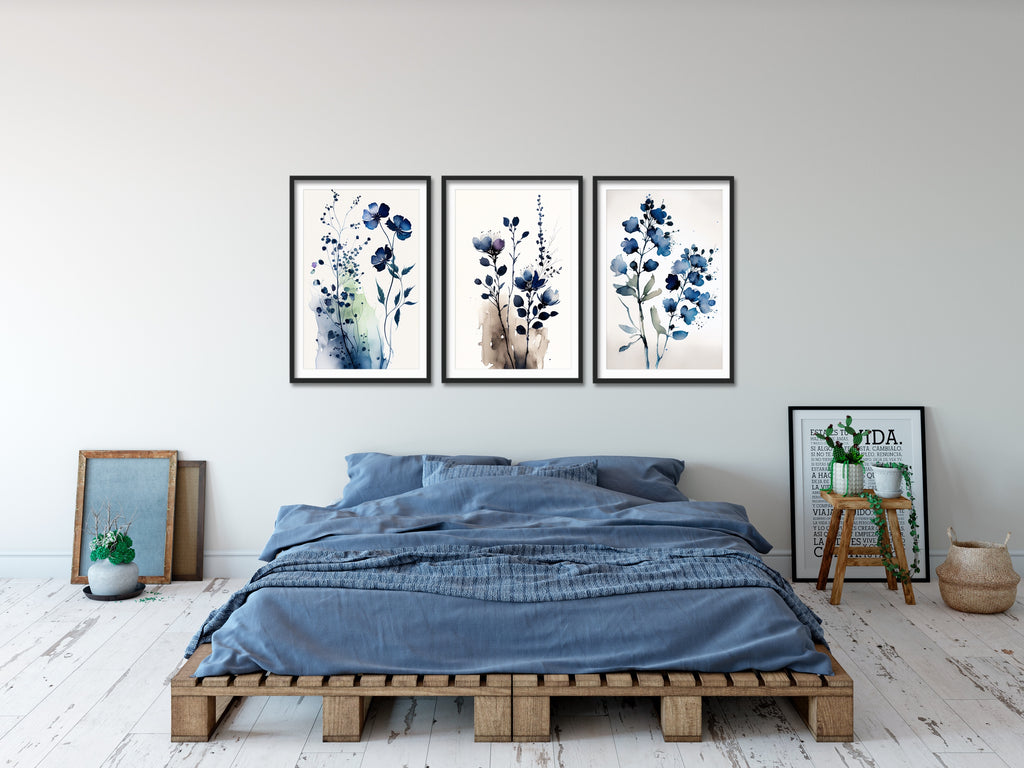 A set of three indigo blue minimalist botanical art prints.